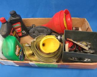 Lot 461. Motor oil, pull strap, funnels, and more