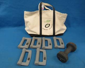 Lot 444. Exercise weights and a canvas carrying bag