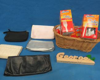 Lot 118. Disposable cutlery, clutch purses, and a decorative basket