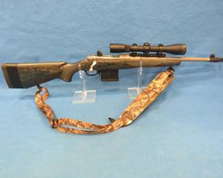Lot 17. Ruger Gunsite Scout semi-auto rifle. SN 680-84705. 5.56 Nato 1/8 twist. Includes Leopold Rifleman 3-9x40MM scope, four magazines, sling, and case.