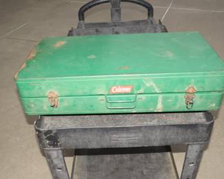 Lot 291. 1960s era metal Coleman portable table and four chairs. All original. Missing one locking clasp.