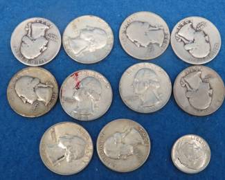Lot 40. Ten silver Washington quarters plus one silver dime