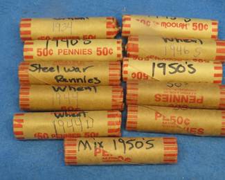 Lot 425. Eleven rolls of 50 wheat pennies each (550 total) marked by the seller including one roll of 1934 and one roll of steel pennies