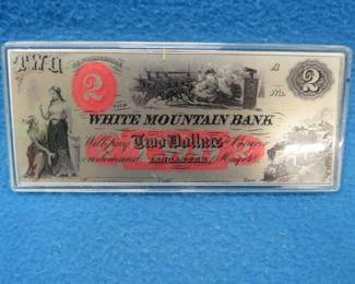 Lot 107. Four troy oz. of .999 silver in a reproduction $2 White Mountain Bank Note