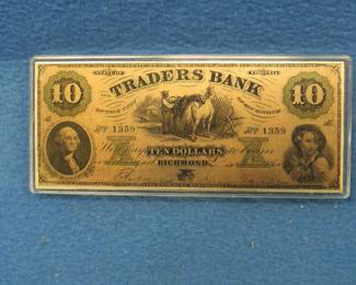 Lot 239. Four troy oz. of .999 silver in a reproduction $10 Traders Bank Note