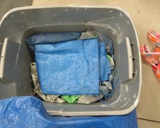 Lot 395. Tarps and poly. Dog not included