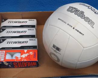 Lot 192. NIP golf balls and a volleyball
