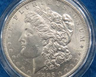 Lot 106. 1885 O Morgan silver dollar
