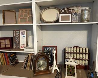 Lenox spice jar set-pepper jar has no lid. Antique mantle clock(over wound), various picture frames, books and candle/tea light burners.