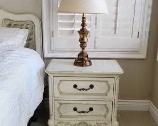 Victorian nightstand with vintage brass lamp