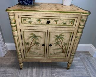 Small side table with palm trees, single drawer, and cabinet. $125.