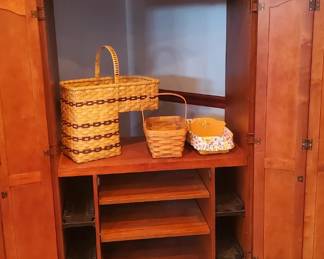 Many pieces of Longaberger baskets