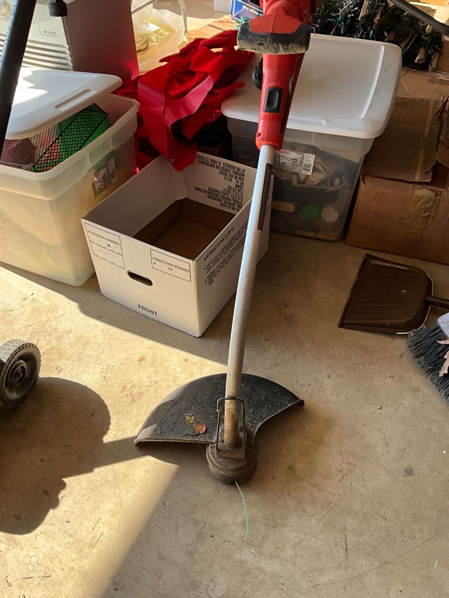 Weedeater in garage
