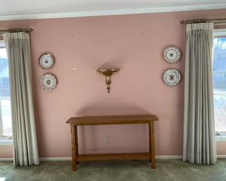 Nice table with decor on wall above