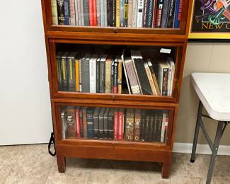 Lawyer’s cabinet - great condition  - 3 levels - glass goes up & in to retrieve books