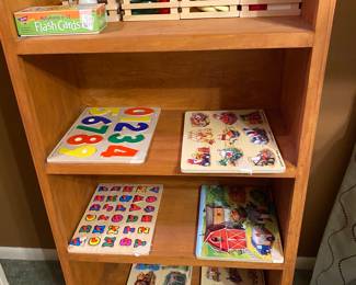 Puzzles & more in bookshelf - all available