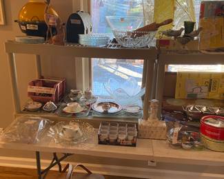 Popcorn popper, metal lunch box, screen cover (yellow) rolling pin, plates set, bowls, silverware set, candles, and more!