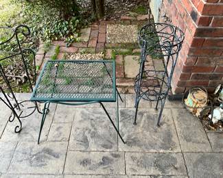 Outside - metal flower holders & green metal table