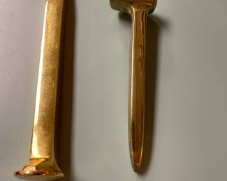 2 brass coated railroad stakes