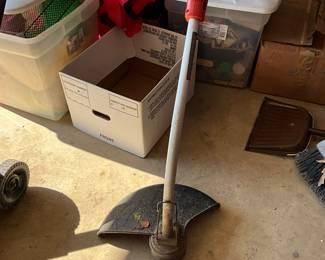 Weedeater in garage