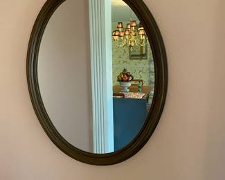 Oval mirror in living room