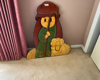 Wooden, painted shepherd with sheep