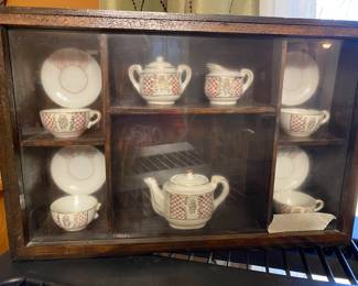 Shelf with collectible tea set