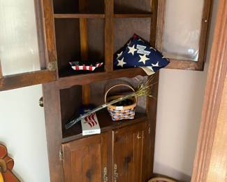 Corner cabinet - moved from basement for easier removal  and round basket