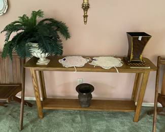 Table with lower shelf in living room - decor