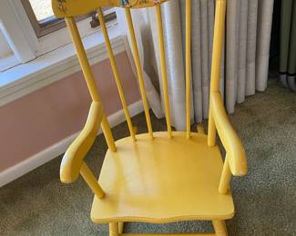 Yellow rocking chair for. Child’s room - note the paintined scene at top of rocker