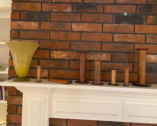 Lamp on left, wooden vintage collectibles to right