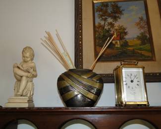 Clock and statues. Art by E. Laforet