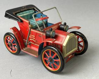 Lot 119 | Vintage Wind Up Lever Action Tin Car
