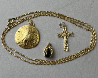 Lot 167 | 14K Crucifix Gold Chain & 2 Pendants
