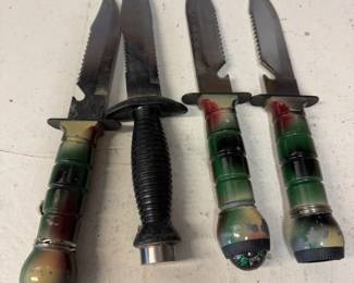 Four Stainless Steel Fishing Knives