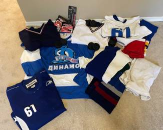 Hockey Jerseys With Leg Warmers Pucks And Others