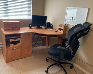Corner Desk With Monitor Chair With Changeable Head Rest Webcam Speakers And Office Supplies