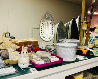 Professional grade irons, pin cushions, pins, ribbon, etc