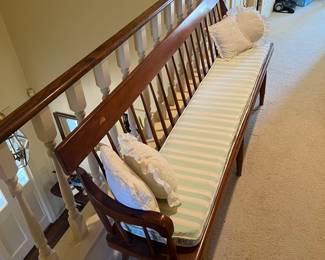 One of two matching antique benches