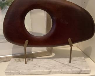 Wood sculpture on a marble base 