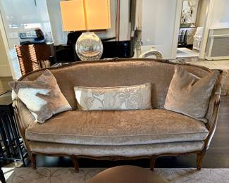 Carved frame sofa. Beautiful neutral upholstery 