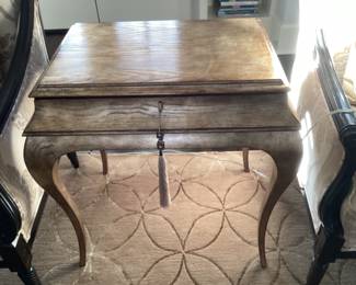 A pair of gold lamp tables with drawer