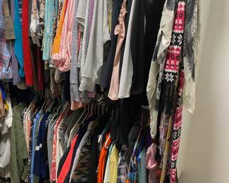 A FANTASTIC SELECTION OF SHIRTS, BLOUSES, DRESSES AND COATS.