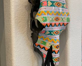NICELY PAINTED COW SKULL DECORATION.