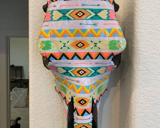 NICELY PAINTED COW SKULL DECORATION.
