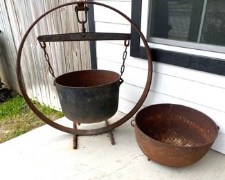 LARGE IRON POTS.