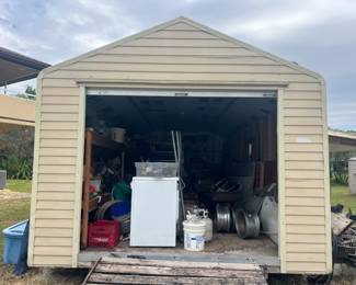 washer and dryer, rims for a Cadillac, barb wire, garden trimming,