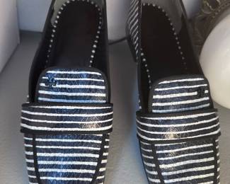 Tory Burch black and white loafers.