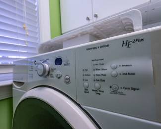 Like New Front Loading GE Electric Dryer with storage below  Model# GFD55ESSN2WW 