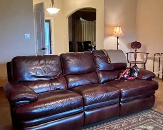 LEATHER COUCH, AREA RUG